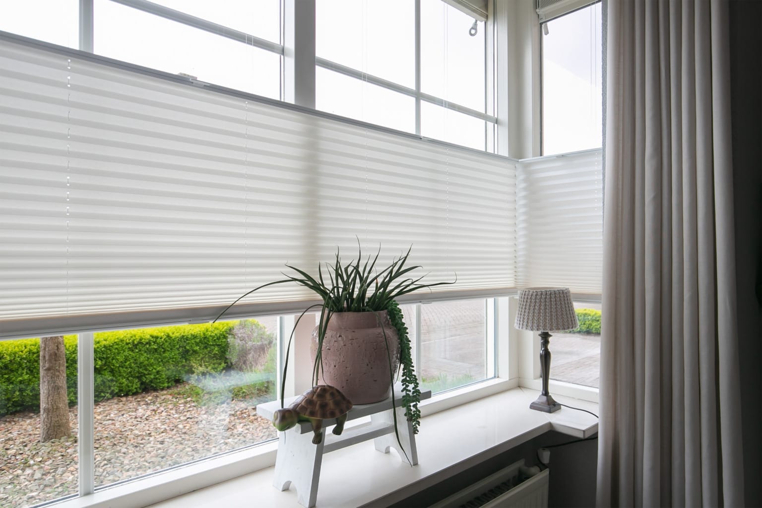 Moderne plissé gordijnen voor strak interieur in Amsterdam